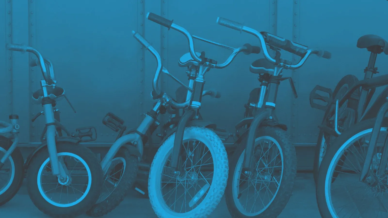 A photograph of childrens' bikes - Opportunities for young people at Oval Learning schools to get funding for projects including active travel, walking, cycling, dance, fitness and sporting activities